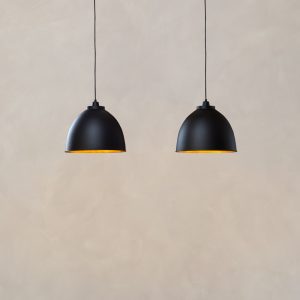 Black and Gold Double Dome Pendant Light with lights on
