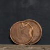 Product shot of two placemat, chargers