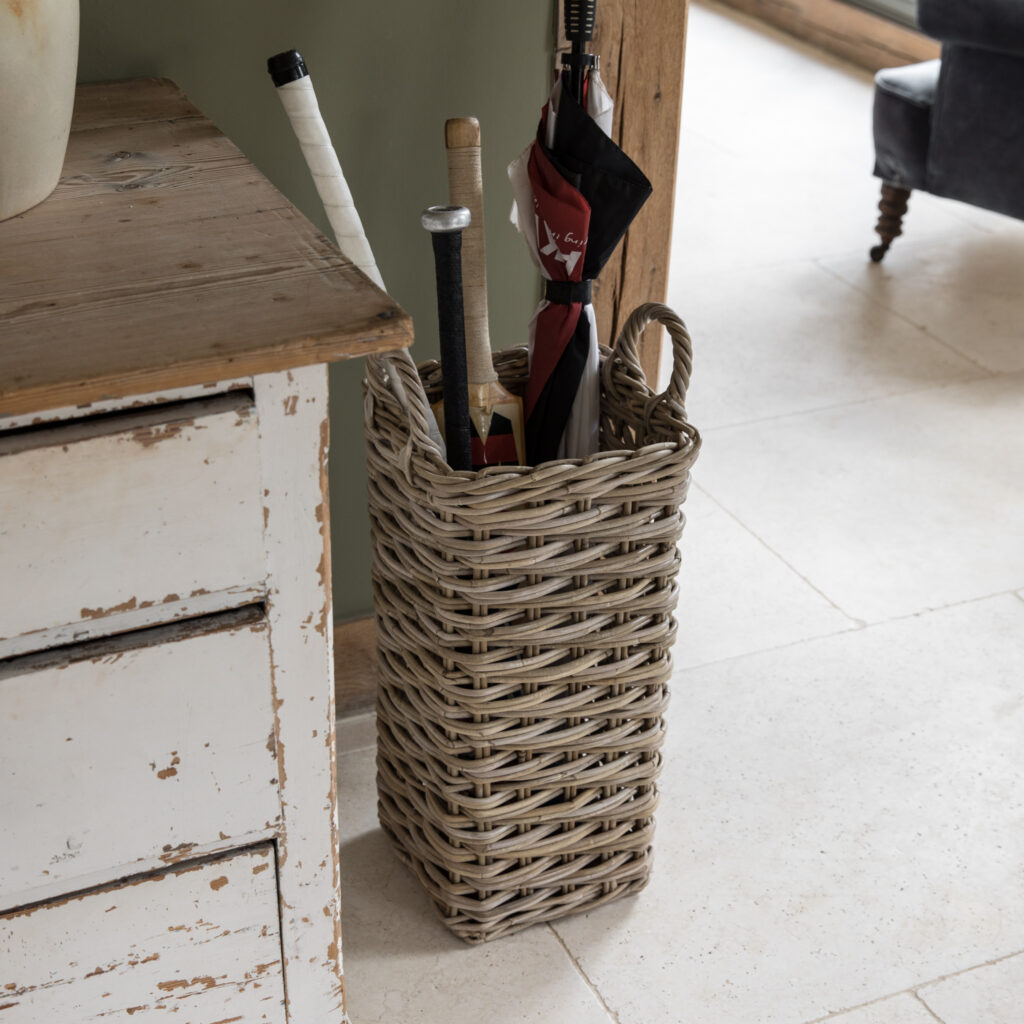 basket for sports sticks and umbrellas